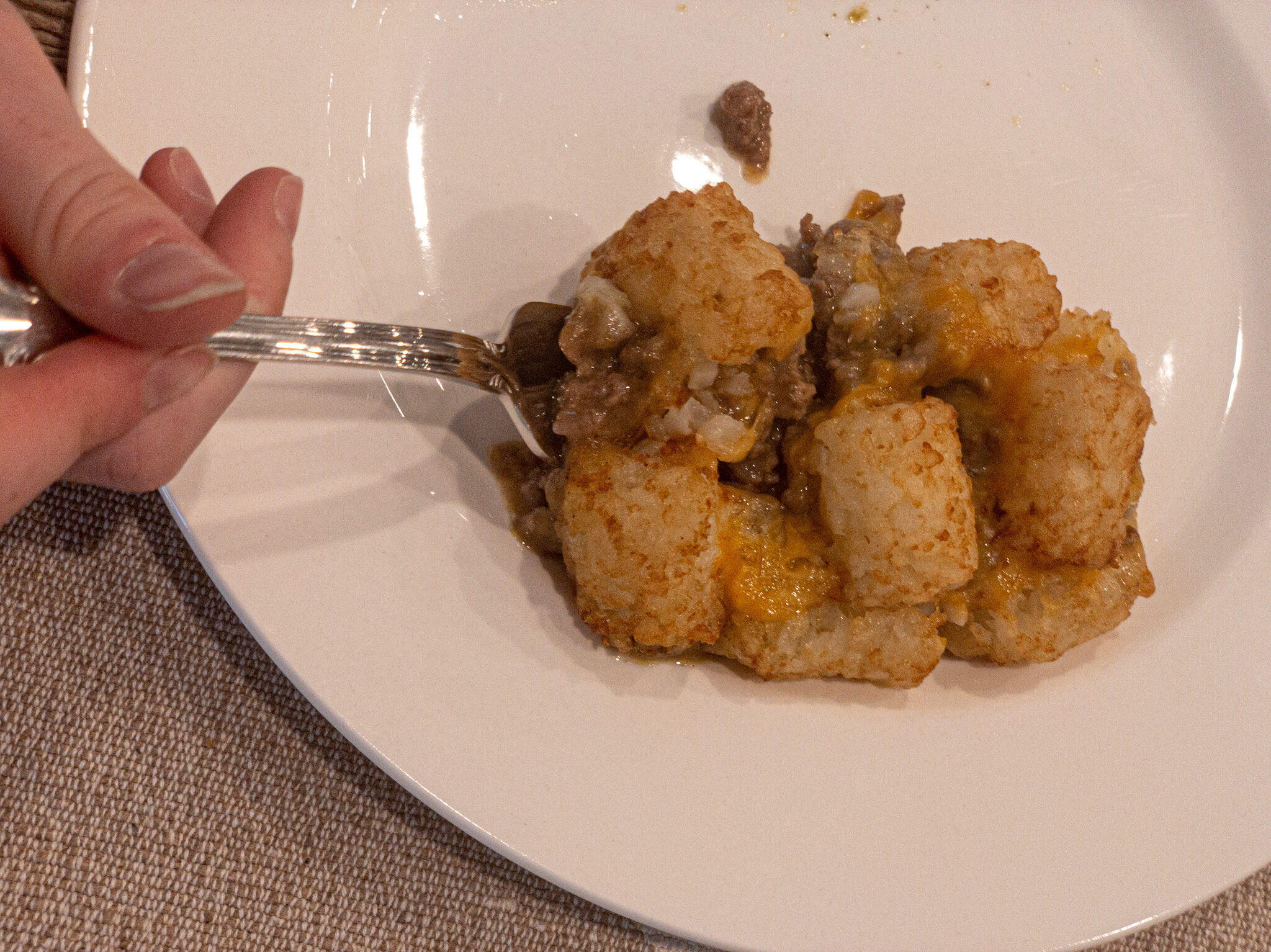 Cheesy Beef Tater Tot Casserole on fork